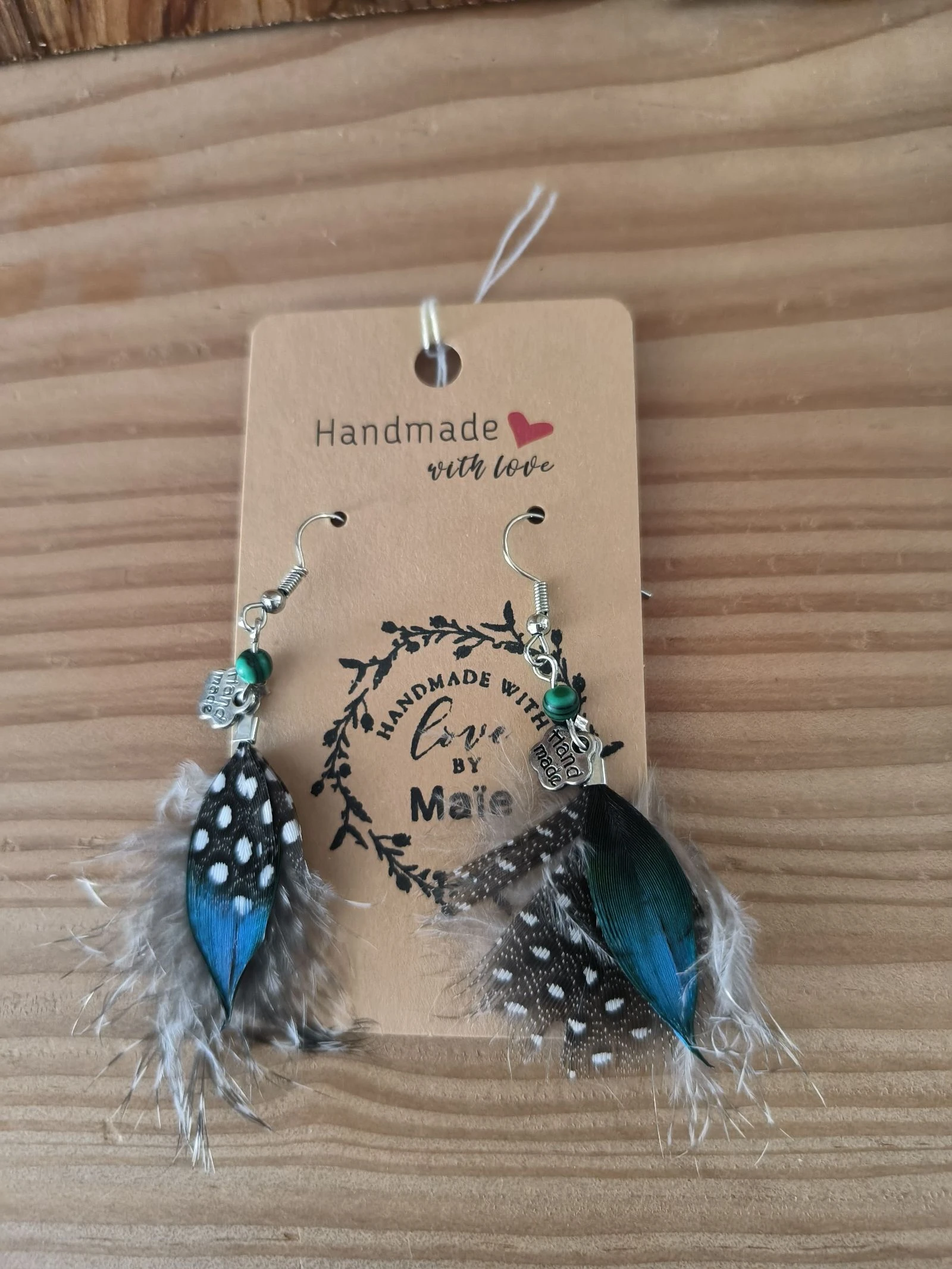 Boucles d'oreilles bohème chic originales en plumes naturelles